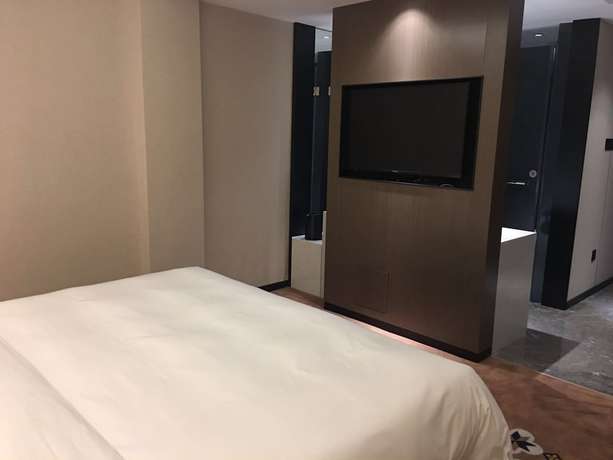 Imagen de la habitación del Hotel Guangzhou Paco - Dongpu Teemall. Foto 8