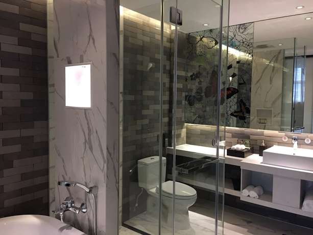 Imagen de la habitación del Hotel Guangzhou Paco - Dongpu Teemall. Foto 9