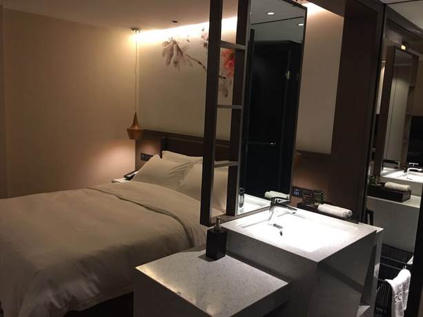 Imagen de la habitación del Hotel Guangzhou Paco - Dongpu Teemall. Foto 10