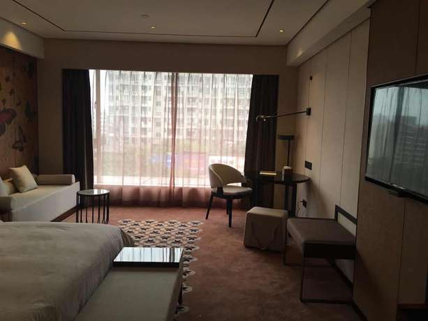 Imagen de la habitación del Hotel Guangzhou Paco - Dongpu Teemall. Foto 11