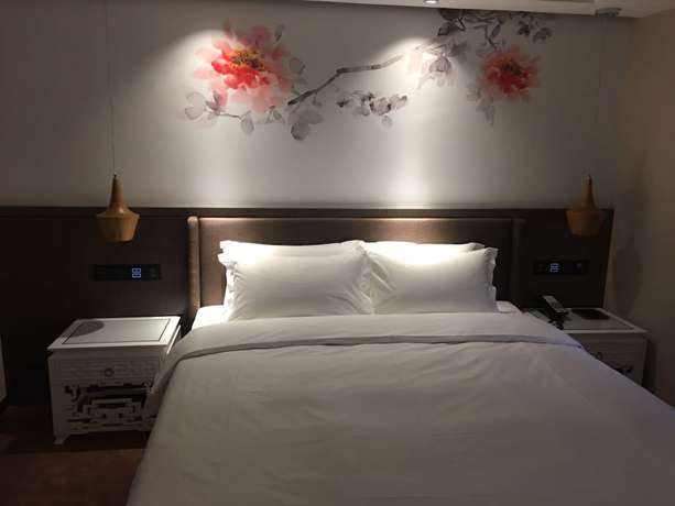 Imagen de la habitación del Hotel Guangzhou Paco - Dongpu Teemall. Foto 12