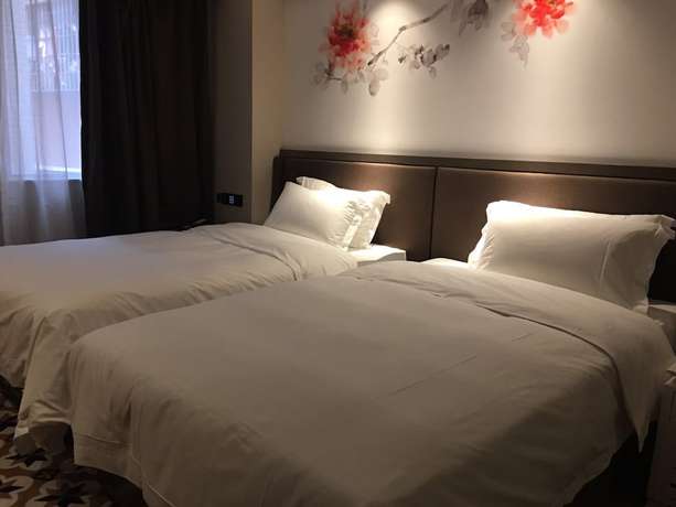 Imagen de la habitación del Hotel Guangzhou Paco - Dongpu Teemall. Foto 13