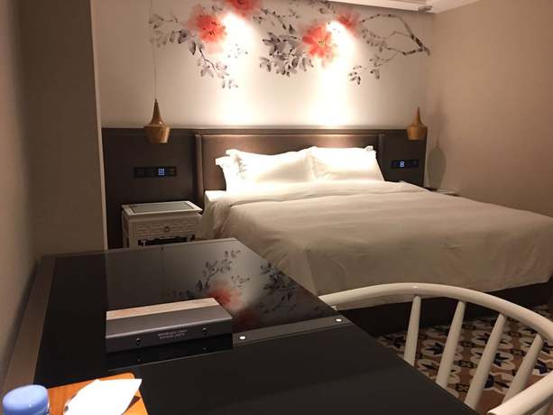 Imagen de la habitación del Hotel Guangzhou Paco - Dongpu Teemall. Foto 14