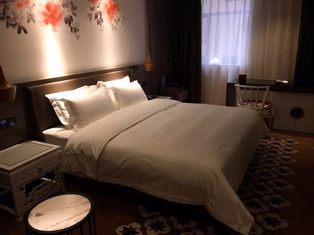 Imagen de la habitación del Hotel Guangzhou Paco - Dongpu Teemall. Foto 15