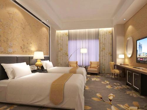 Imagen de la habitación del Hotel Guangzhou Pan Yu President. Foto 4