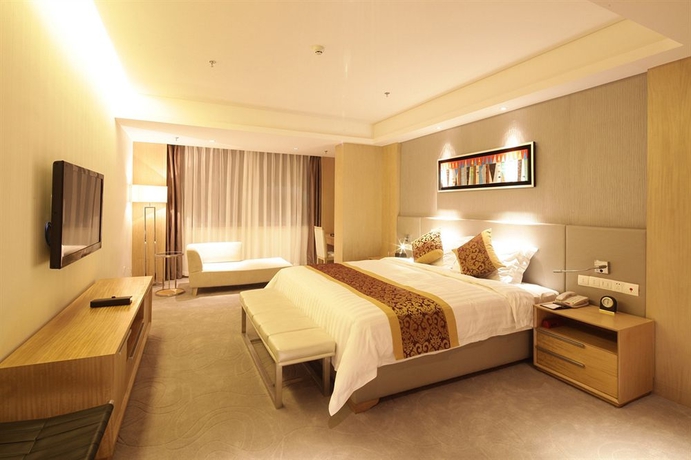 Imagen de la habitación del Hotel Guangzhou Pearl River International. Foto 3