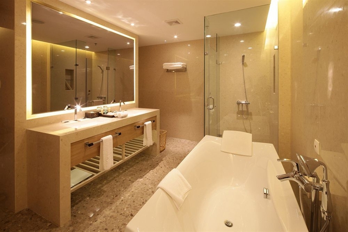 Imagen de la habitación del Hotel Guangzhou Pearl River International. Foto 6