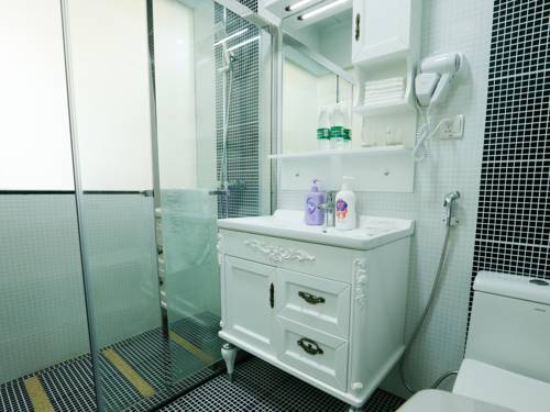 Imagen de la habitación del Hotel Guangzhou Pengman Apartment Huanshidong. Foto 4