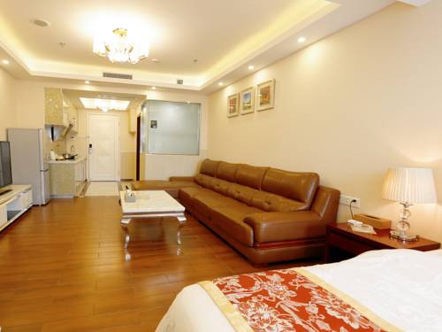 Imagen de la habitación del Hotel Guangzhou Pengman Apartment Huanshidong. Foto 5