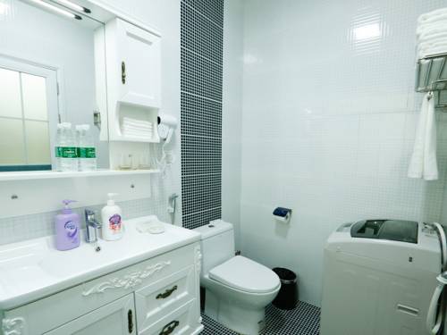 Imagen de la habitación del Hotel Guangzhou Pengman Apartment Huanshidong. Foto 8