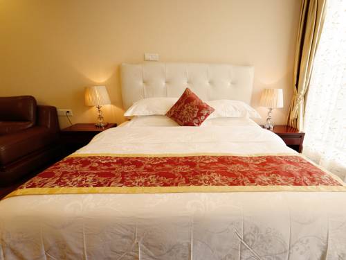 Imagen de la habitación del Hotel Guangzhou Pengman Apartment Huanshidong. Foto 17