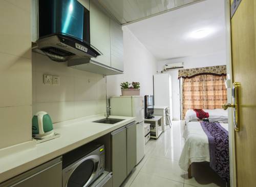 Imagen de la habitación del Hotel Guangzhou Pin Jing Bo Lin Apartment. Foto 2