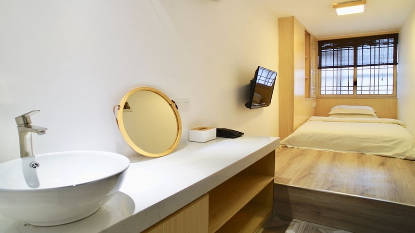 Imagen de la habitación del Hotel Guangzhou Pinecone and Huayi Select. Foto 3