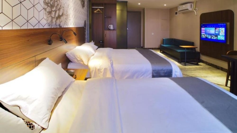 Imagen de la habitación del Hotel Guangzhou Pinecone and Huayi Select. Foto 5