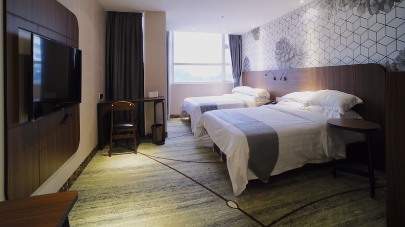 Imagen de la habitación del Hotel Guangzhou Pinecone and Huayi Select. Foto 12