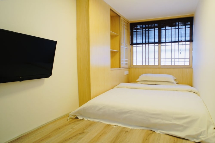 Imagen de la habitación del Hotel Guangzhou Pinecone and Huayi Select. Foto 13