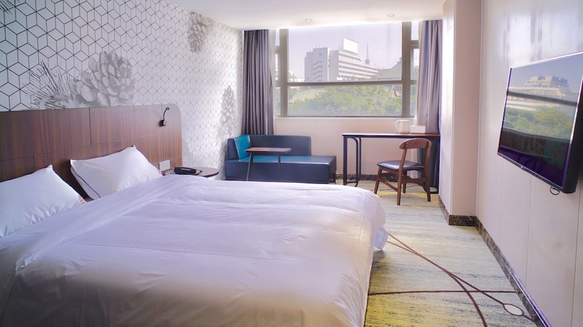 Imagen de la habitación del Hotel Guangzhou Pinecone and Huayi Select. Foto 14