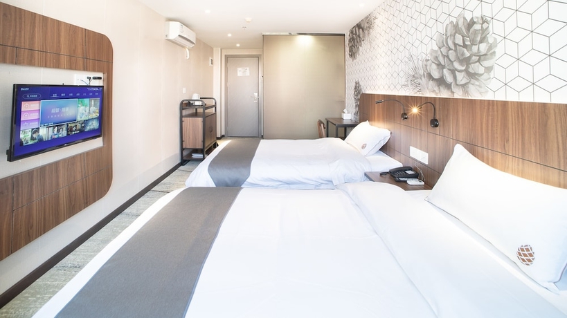 Imagen de la habitación del Hotel Guangzhou Pinecone and Huayi Select. Foto 15