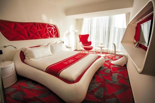 Imagen de la habitación del Hotel Guangzhou Planet. Foto 6