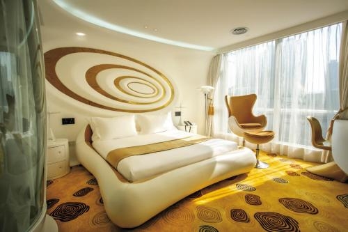 Imagen de la habitación del Hotel Guangzhou Planet. Foto 10