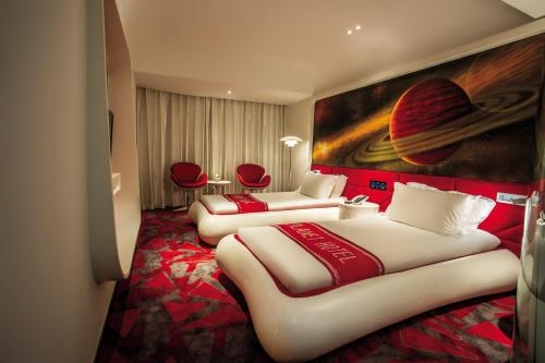 Imagen de la habitación del Hotel Guangzhou Planet. Foto 12