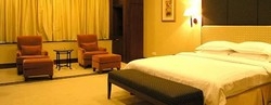 Imagen de la habitación del Hotel Guangzhou Regal Riviera. Foto 2