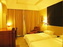 Imagen de la habitación del Hotel Guangzhou Regal Riviera. Foto 3