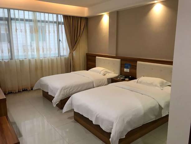 Imagen de la habitación del Hotel Guangzhou Rongting Business. Foto 3