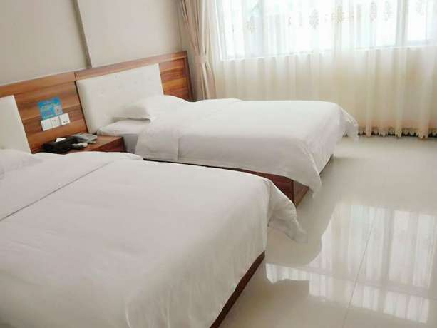 Imagen de la habitación del Hotel Guangzhou Rongting Business. Foto 5