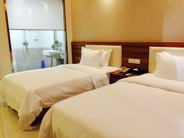 Imagen de la habitación del Hotel Guangzhou Rongting Business. Foto 6