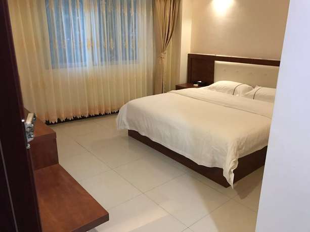 Imagen de la habitación del Hotel Guangzhou Rongting Business. Foto 7