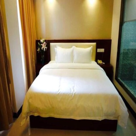 Imagen de la habitación del Hotel Guangzhou Rongting Business. Foto 9