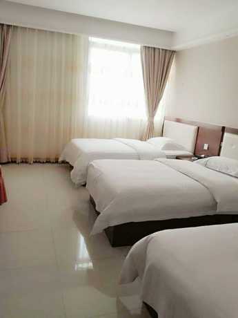 Imagen de la habitación del Hotel Guangzhou Rongting Business. Foto 11