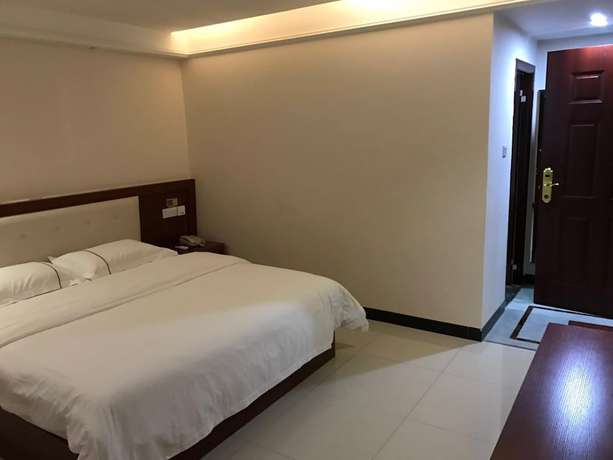 Imagen de la habitación del Hotel Guangzhou Rongting Business. Foto 13