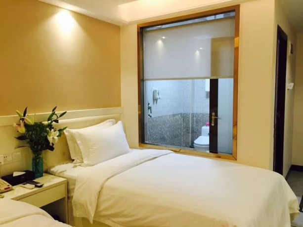 Imagen de la habitación del Hotel Guangzhou Rongting Business. Foto 14