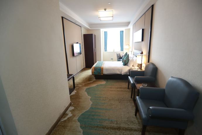 Imagen de la habitación del Hotel Guangzhou Seaman's Club. Foto 13
