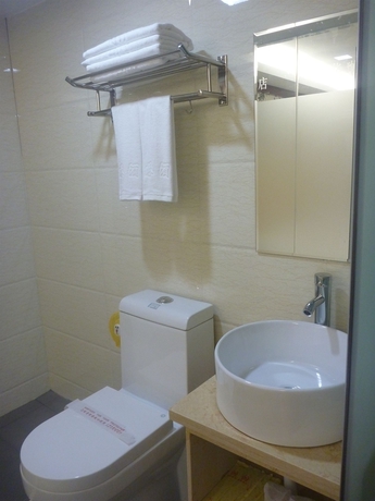 Imagen de la habitación del Hotel Guangzhou Shang Jiu Wan. Foto 2