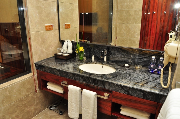 Imagen de la habitación del Hotel Guangzhou Tongyu International. Foto 8
