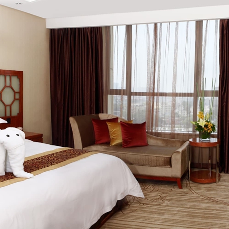 Imagen de la habitación del Hotel Guangzhou Tongyu International. Foto 12