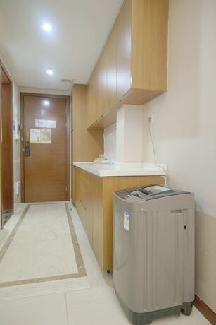 Imagen de la habitación del Hotel Guangzhou Uhome International Apartment. Foto 17