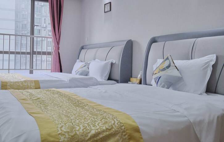 Imagen de la habitación del Hotel Guangzhou Uhome International Apartment. Foto 18