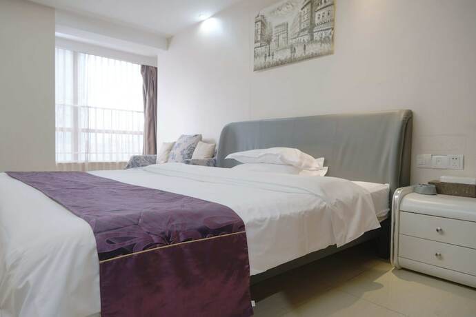 Imagen de la habitación del Hotel Guangzhou Uhome International Apartment. Foto 19