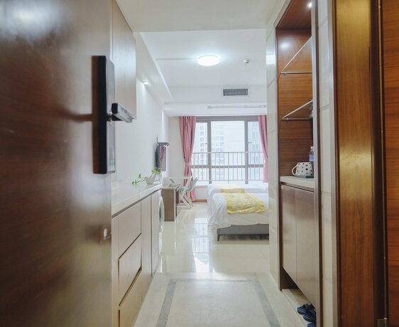 Imagen de la habitación del Hotel Guangzhou Uhome International Apartment. Foto 20