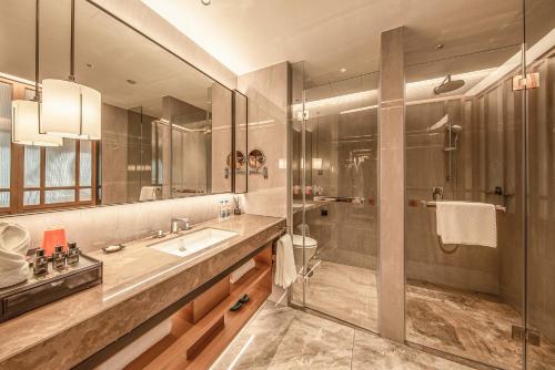 Imagen de la habitación del Hotel Guangzhou Vlamhoo. Foto 16