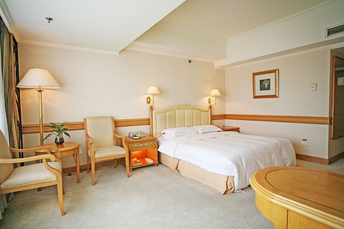 Imagen de la habitación del Hotel Guangzhou, Xi Cheng. Foto 2