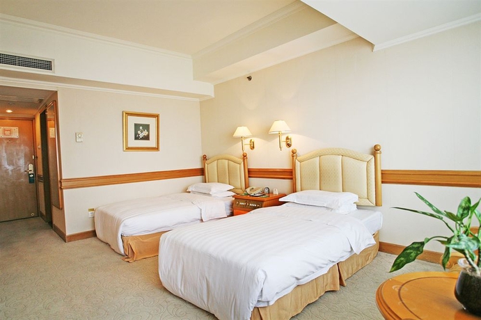 Imagen de la habitación del Hotel Guangzhou, Xi Cheng. Foto 3