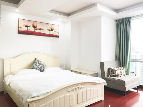 Imagen de la habitación del Hotel Guangzhou Xingke Apartment. Foto 6