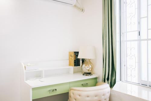 Imagen de la habitación del Hotel Guangzhou Xingke Apartment. Foto 9