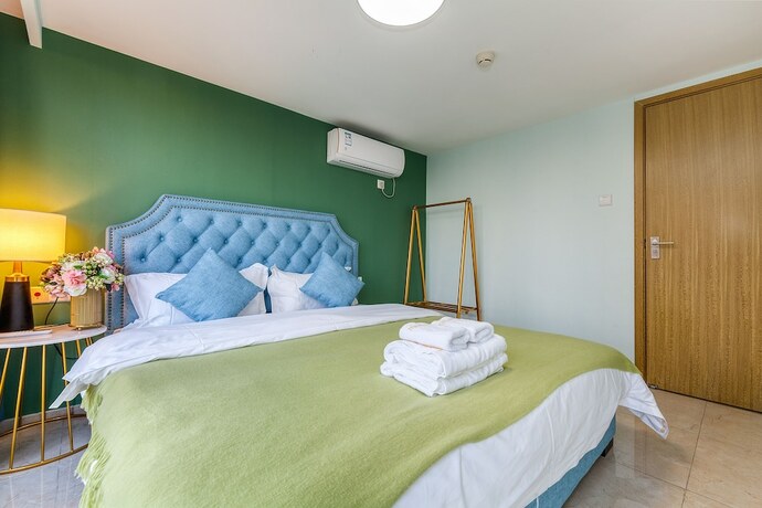 Imagen de la habitación del Hotel Guangzhou Xinlin Apartment. Foto 17
