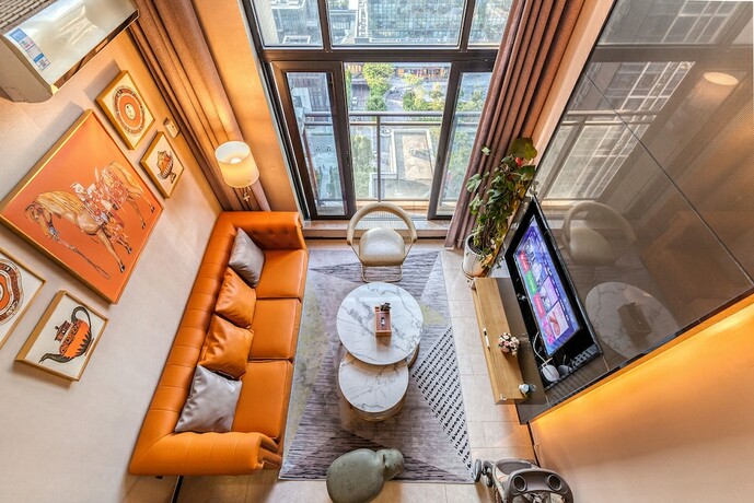Imagen de la habitación del Hotel Guangzhou Xinlin Apartment. Foto 18